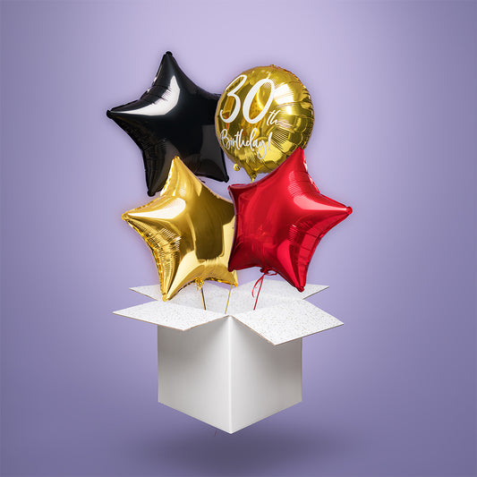 Zestaw balonów foliowych na 30. urodziny: złoty okrągły balon z napisem „30th Birthday” oraz trzy gwiazdy – czarna, złota i czerwona – wypełnione helem i wyskakujące z białego kartonu.